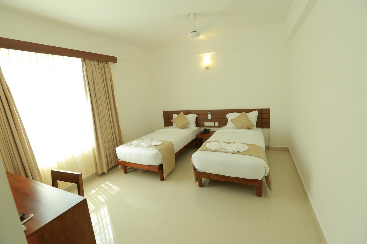 Niko Hotels Kochi Buitenkant foto