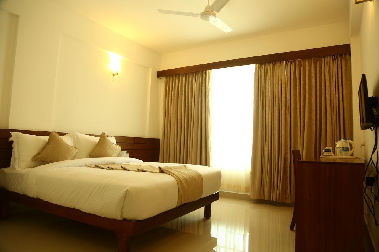 Niko Hotels Kochi Buitenkant foto