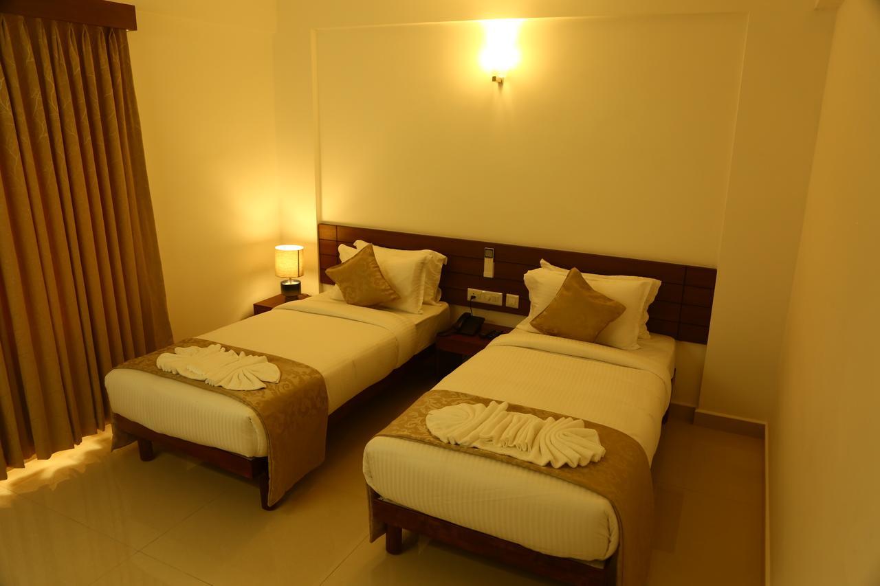 Niko Hotels Kochi Buitenkant foto