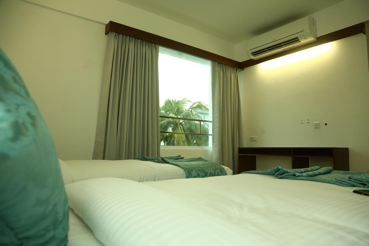 Niko Hotels Kochi Buitenkant foto