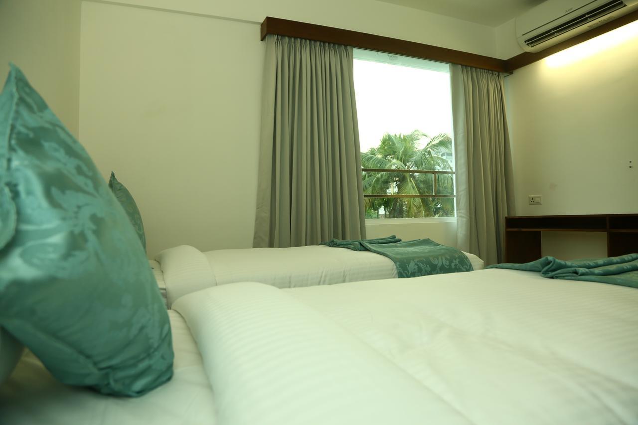 Niko Hotels Kochi Buitenkant foto