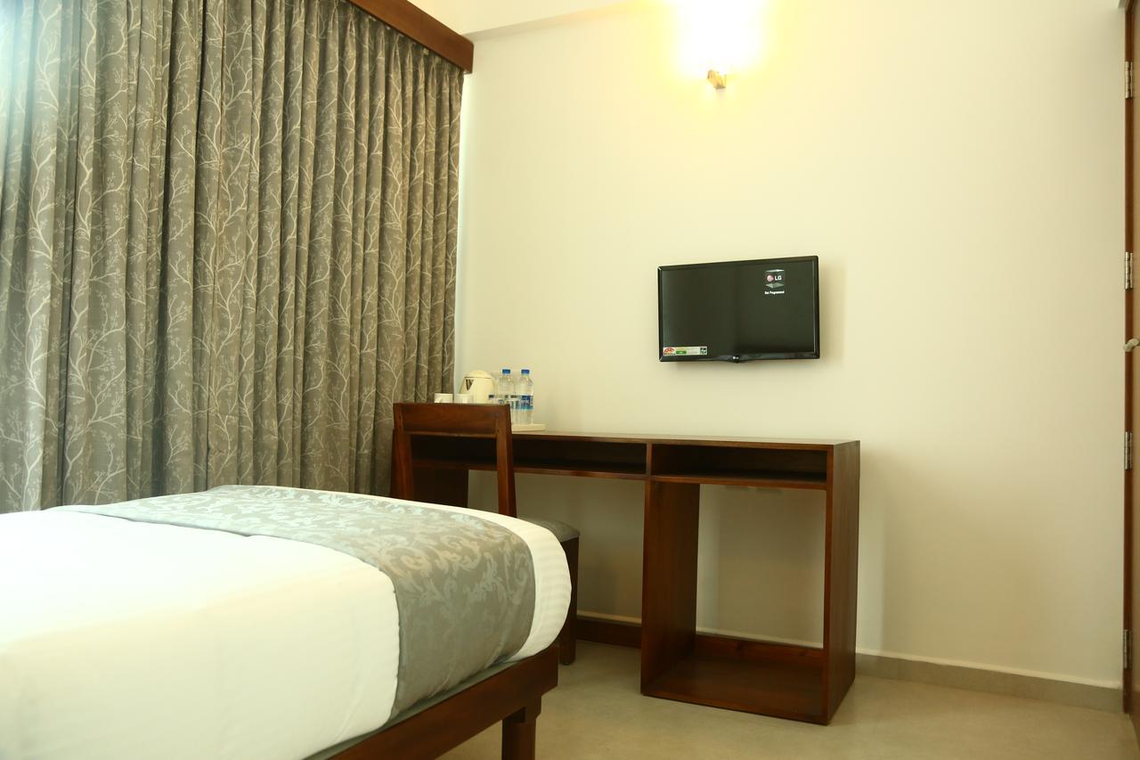 Niko Hotels Kochi Buitenkant foto