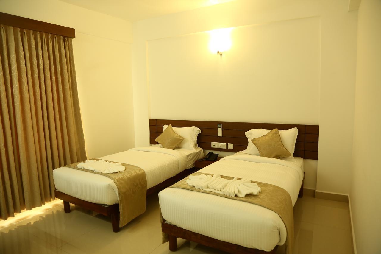 Niko Hotels Kochi Buitenkant foto