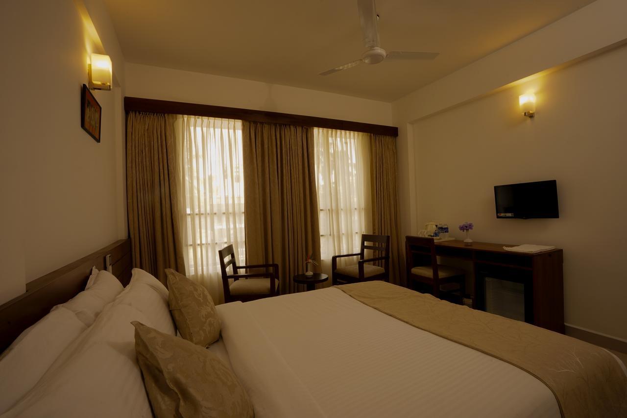 Niko Hotels Kochi Buitenkant foto