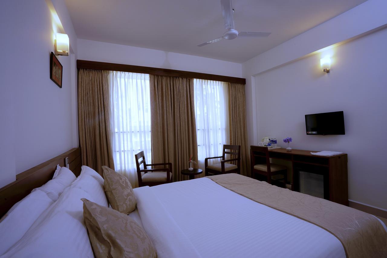 Niko Hotels Kochi Buitenkant foto